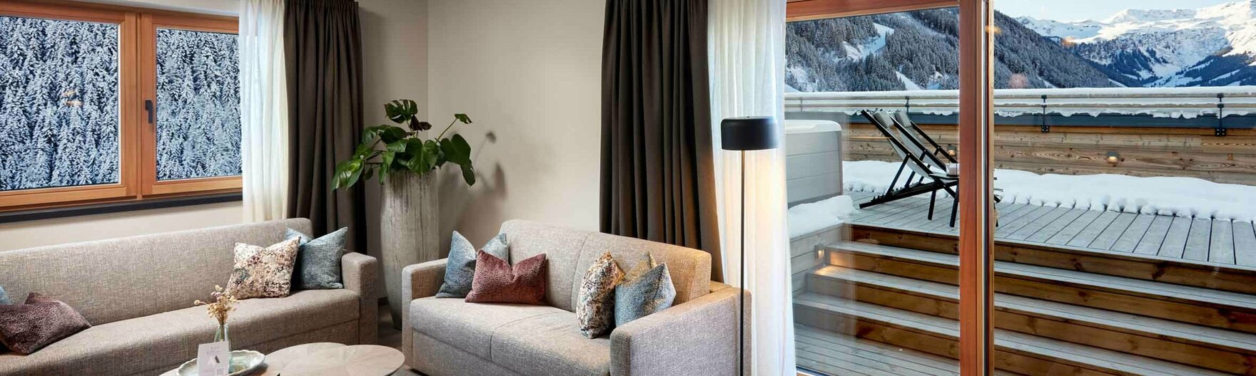 Wohnzimmer im Penthouse Ausblick aus dem Wohnzimmer im Penthouse