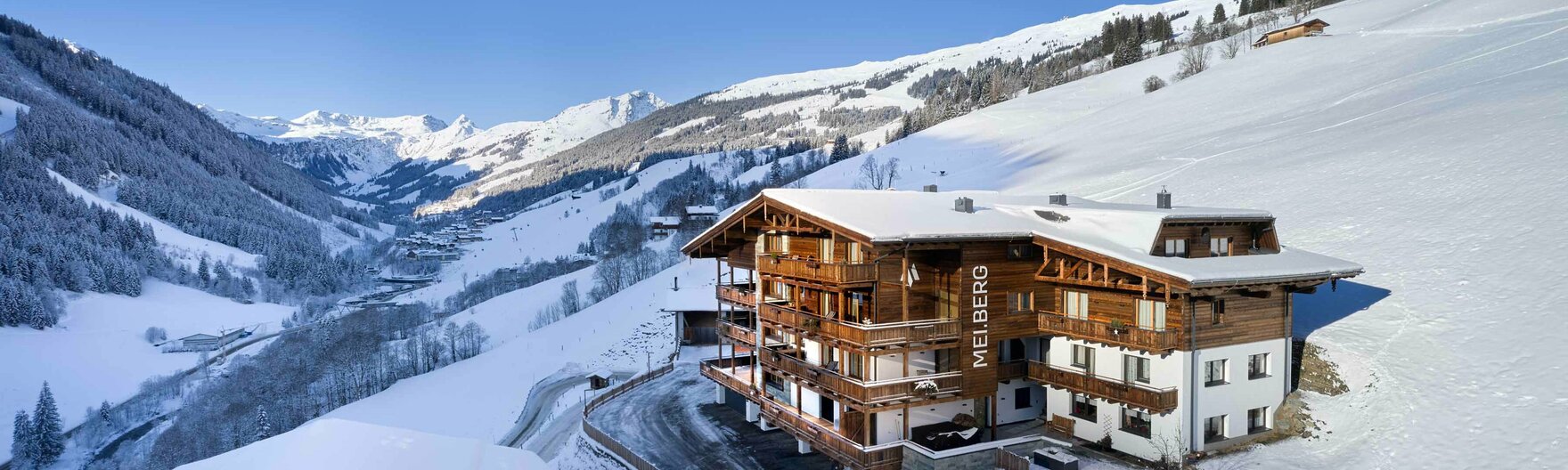 Winterpanorama des Mei.Berg Appartementhauses