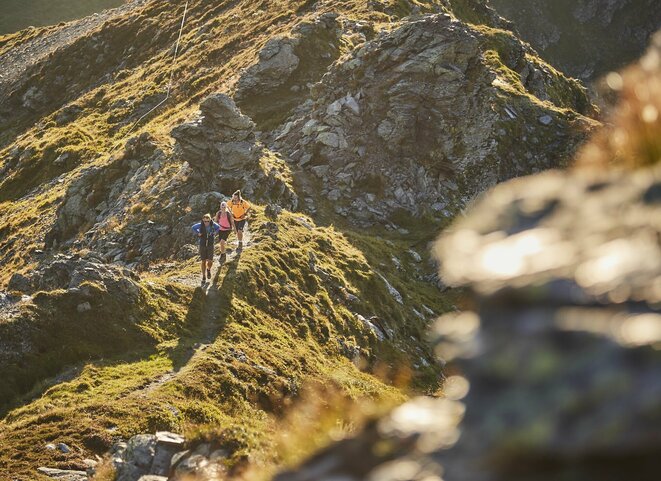 Drei Wanderer im Gebirge