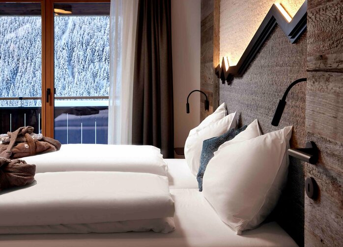 Schlafzimmer-Ausblick in den Mei.Berg Appartements